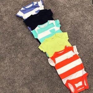 Five newborn onesies